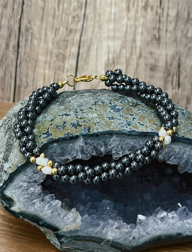 3mm Hematite Beads and Freshwater Pearl on Yellow Gold Metal Base