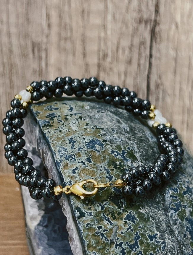 3mm Hematite Beads and Freshwater Pearl on Yellow Gold Metal Base