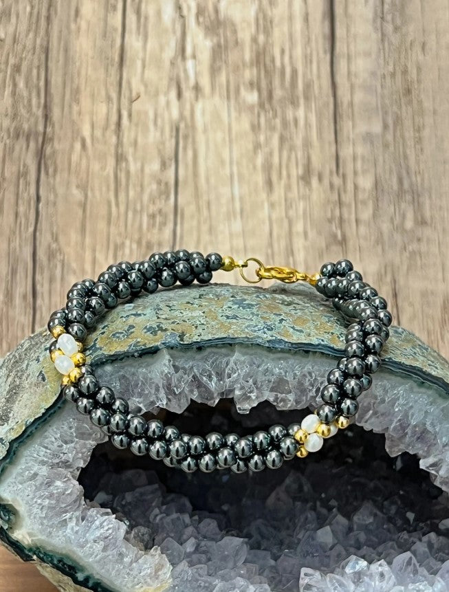 3mm Hematite Beads and Freshwater Pearl on Yellow Gold Metal Base